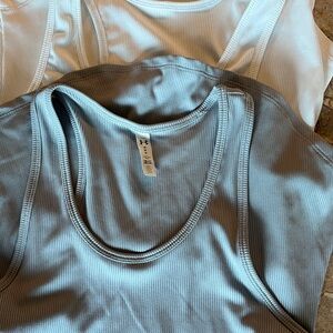 Under Armour Sky Blue and White Athletic Tanks